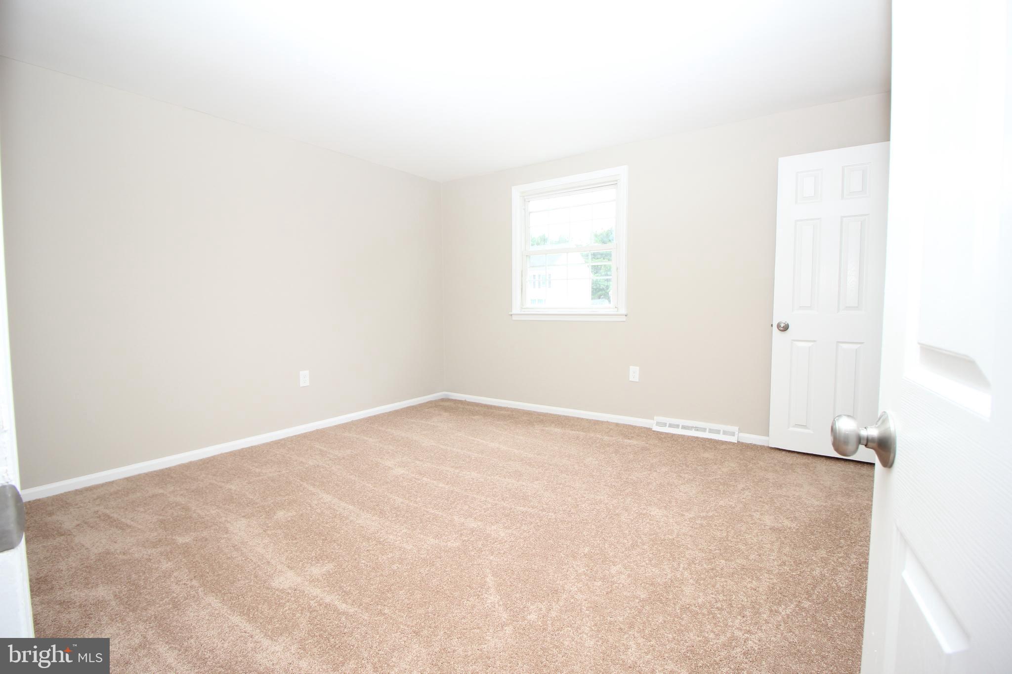 27 West Kennedy Drive Clementon, NJ 08021 - Photo 31 of 39 an empty room with a window