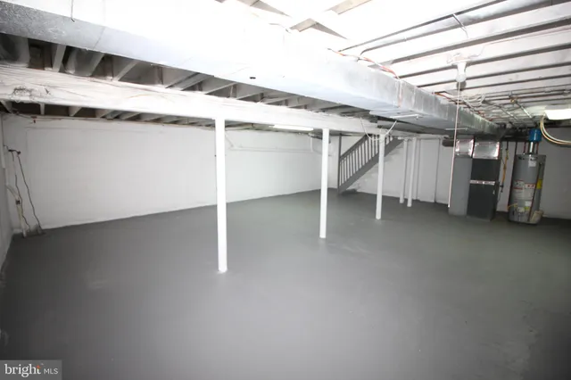 a view of a room with wooden walls