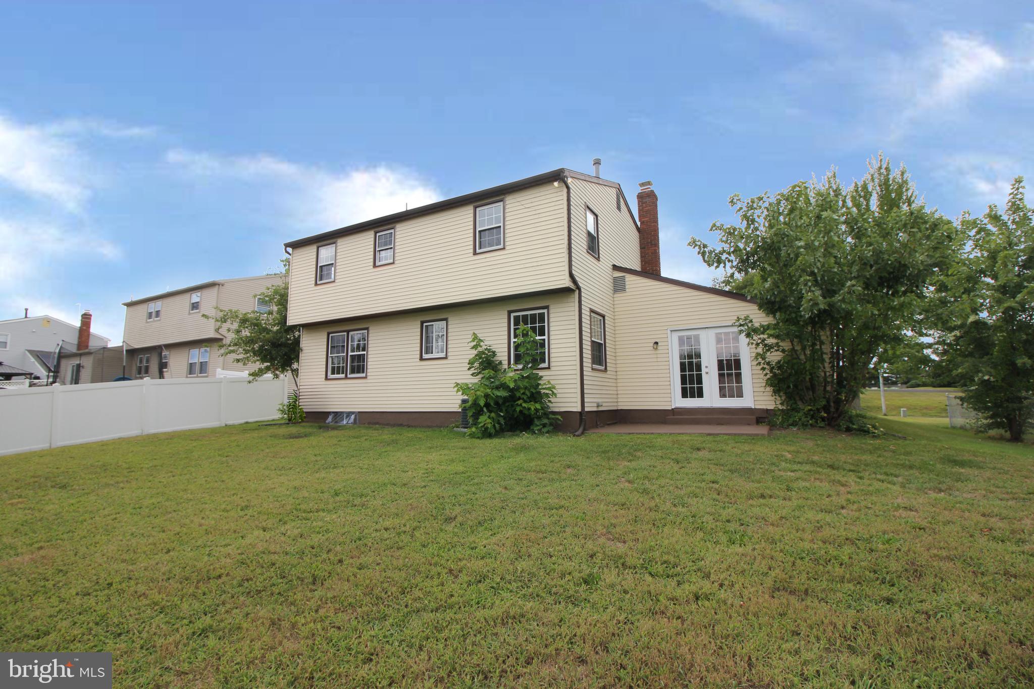 27 West Kennedy Drive Clementon, NJ 08021 - Photo 37 of 39 a front view of a house with a yard and garage