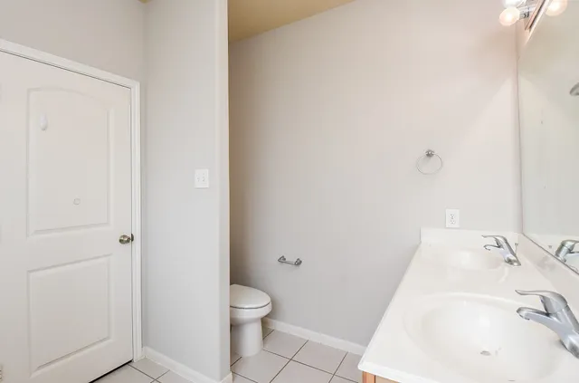 a bathroom with a sink and toilet