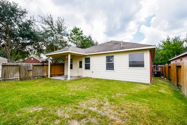 a view of a backyard with a small cabin