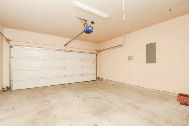 an aerial view of a house with a garden