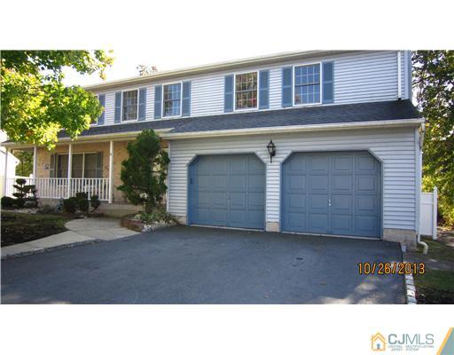 6 Valarie Road Edison, NJ 08820 - Photo 1 of 23 a black and white building with a street