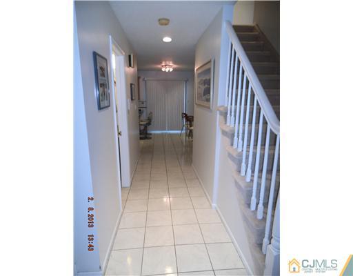 6 Valarie Road Edison, NJ 08820 - Photo 10 of 23 a view of a hallway with windows