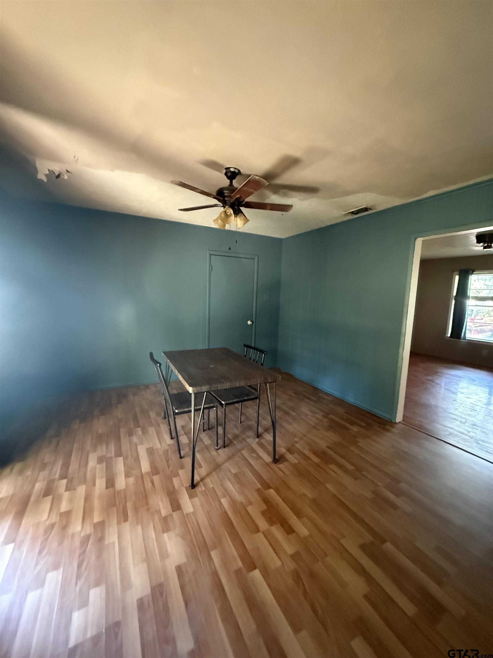 200 East Scenic Loop Hawkins, TX 75765 - Photo 4 of 17 wooden floor in a hall with an empty room