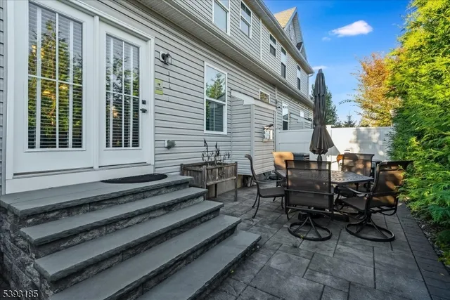 a backyard of a house with seating space