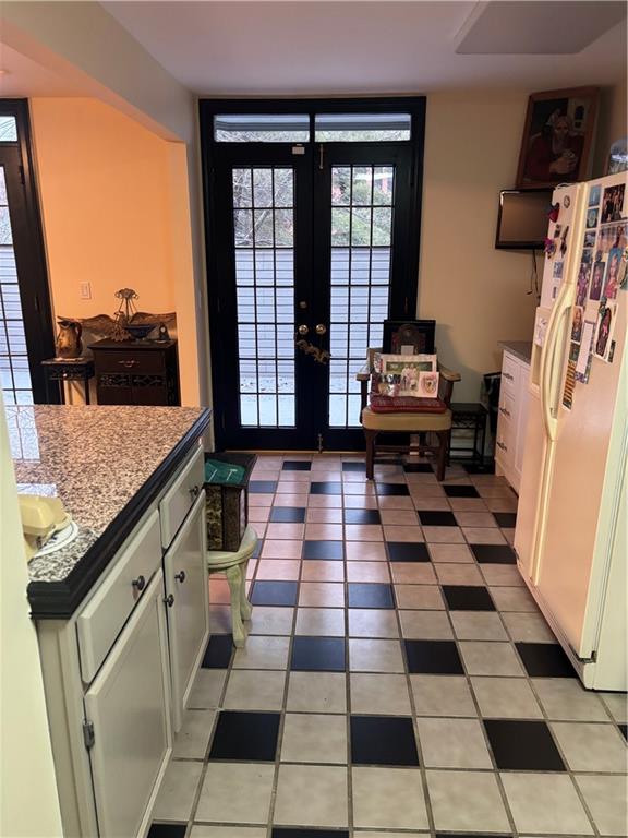 100 Denniston Street, Unit 59 Pittsburgh, PA 15206 - Photo 13 of 24 a black and white checkered floor