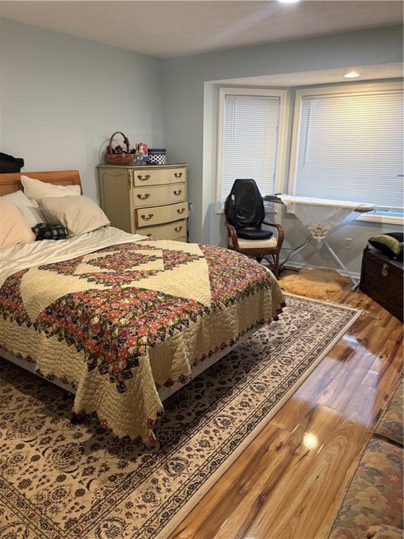 100 Denniston Street, Unit 59 Pittsburgh, PA 15206 - Photo 19 of 24 a bedroom with a bed and window