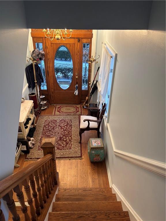 100 Denniston Street, Unit 59 Pittsburgh, PA 15206 - Photo 3 of 24 a living room with furniture and a wooden floor
