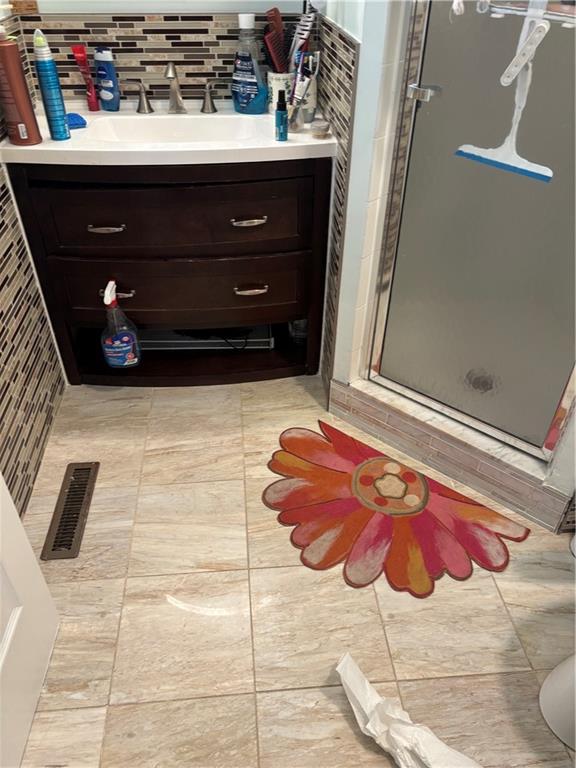 100 Denniston Street, Unit 59 Pittsburgh, PA 15206 - Photo 8 of 24 a bathroom with a sink and a mirror