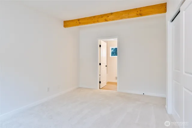 a view of a house with yard and tree s