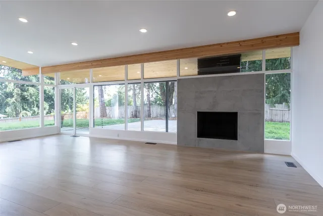 a bathroom with a toilet and a mirror