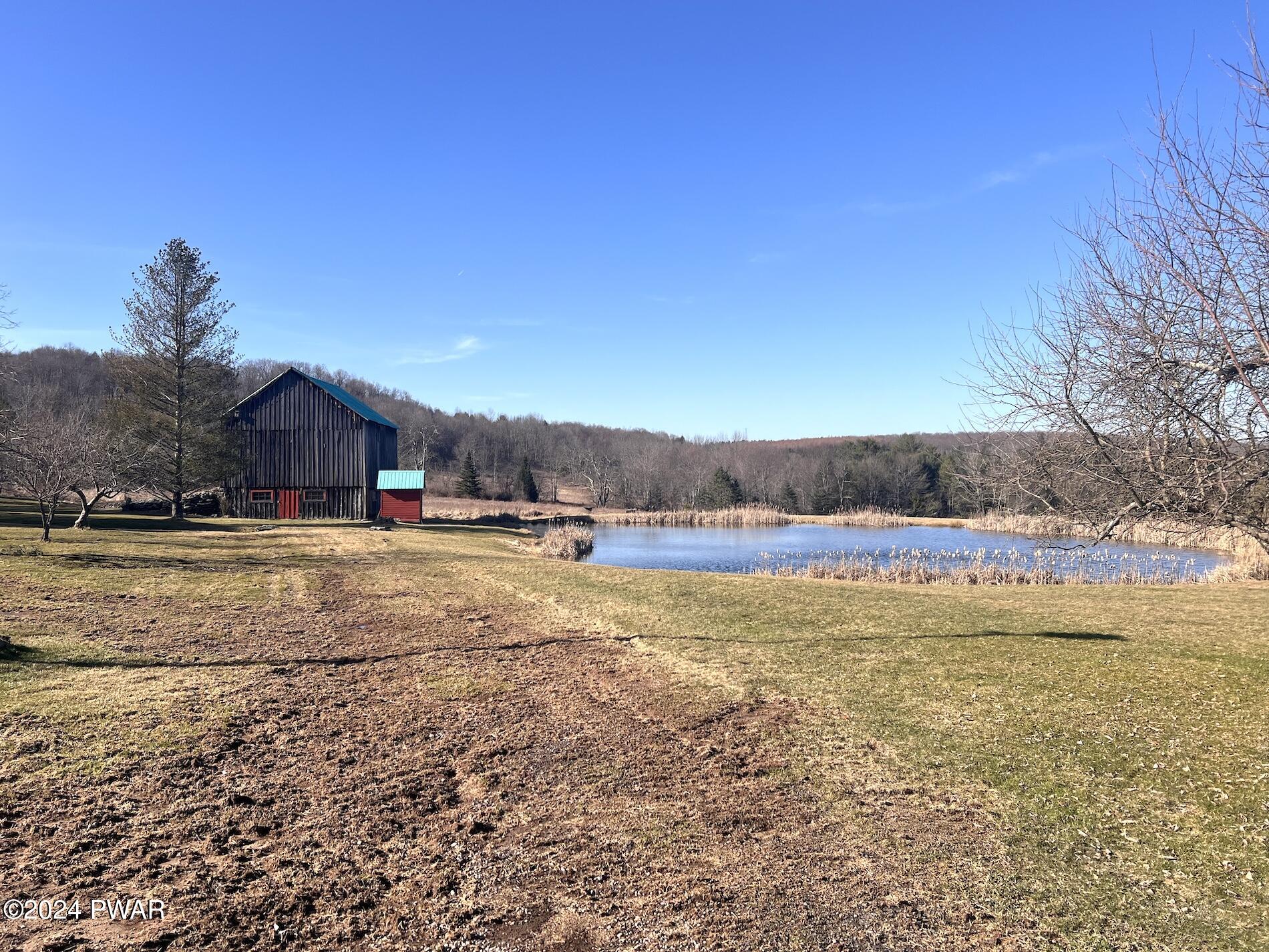 403 Stalker Road Equinunk, PA 18417 - Photo 1 of 15 105 COUNTRY ACRES + BARN & POND