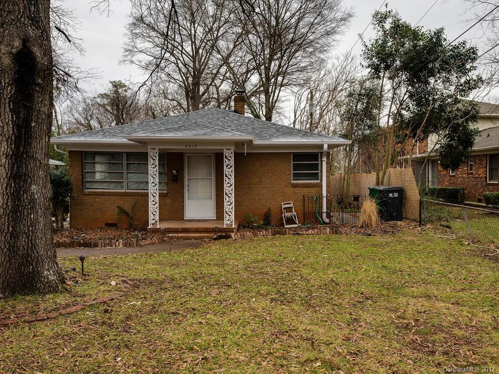 4315 Walker Road Charlotte, NC 28211 - Photo 2 of 14 a house with yard in front of it