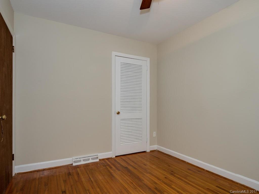 4315 Walker Road Charlotte, NC 28211 - Photo 11 of 14 a view of an empty room with wooden floor