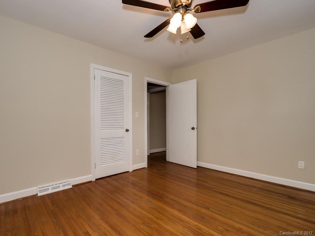 4315 Walker Road Charlotte, NC 28211 - Photo 13 of 14 a view of an empty room with wooden floor