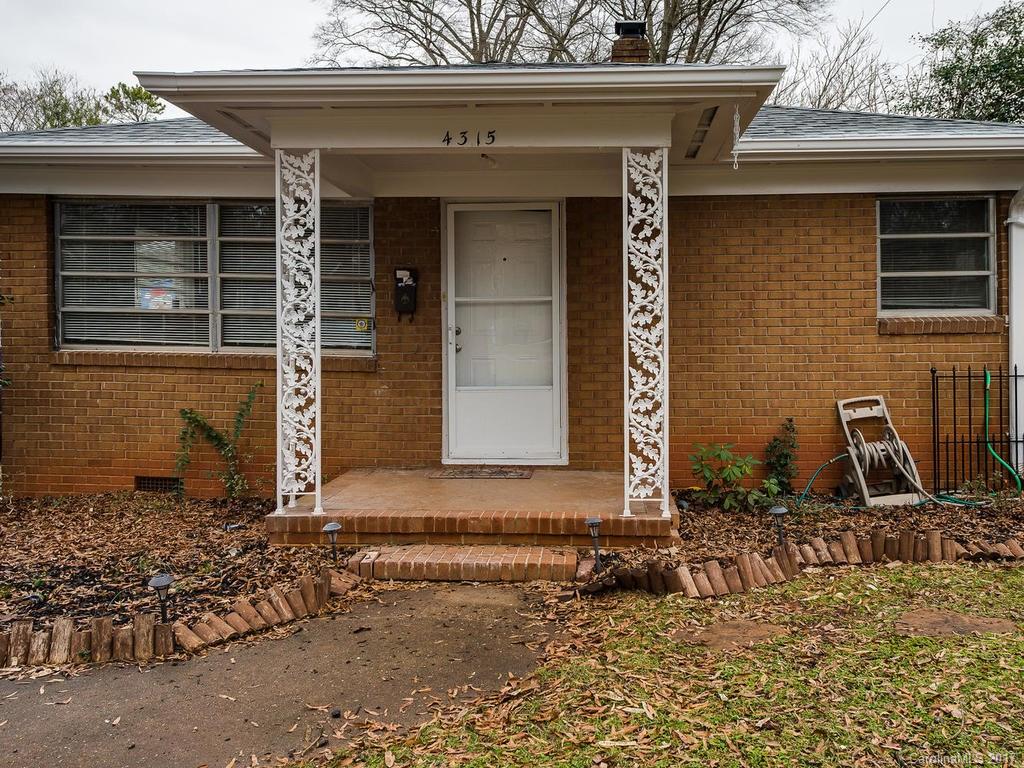 4315 Walker Road Charlotte, NC 28211 - Photo 3 of 14 a front view of a house
