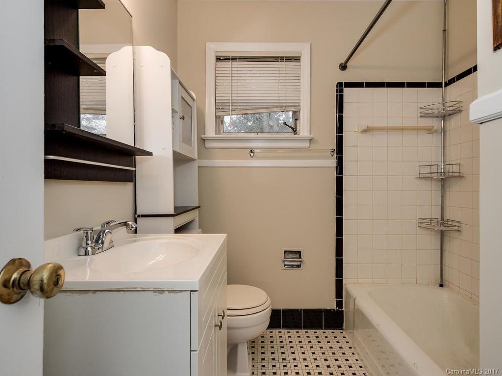 4315 Walker Road Charlotte, NC 28211 - Photo 9 of 14 a bathroom with a sink toilet and shower