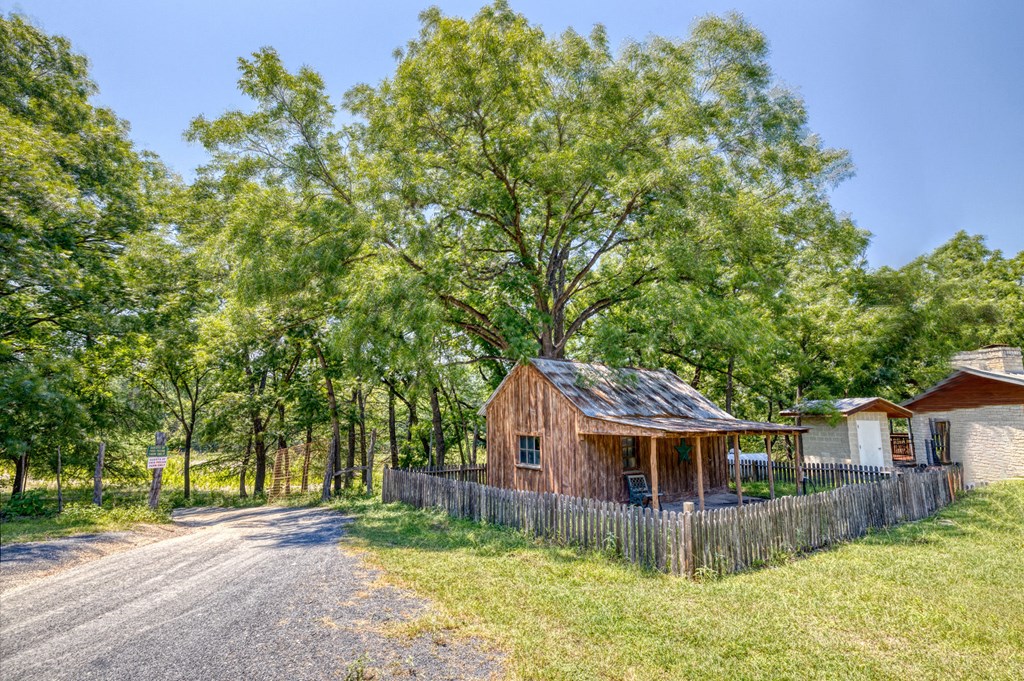 98 Red Wright Road Rio Frio, TX 78879 - Photo 22 of 44 front view of a house with a yard
