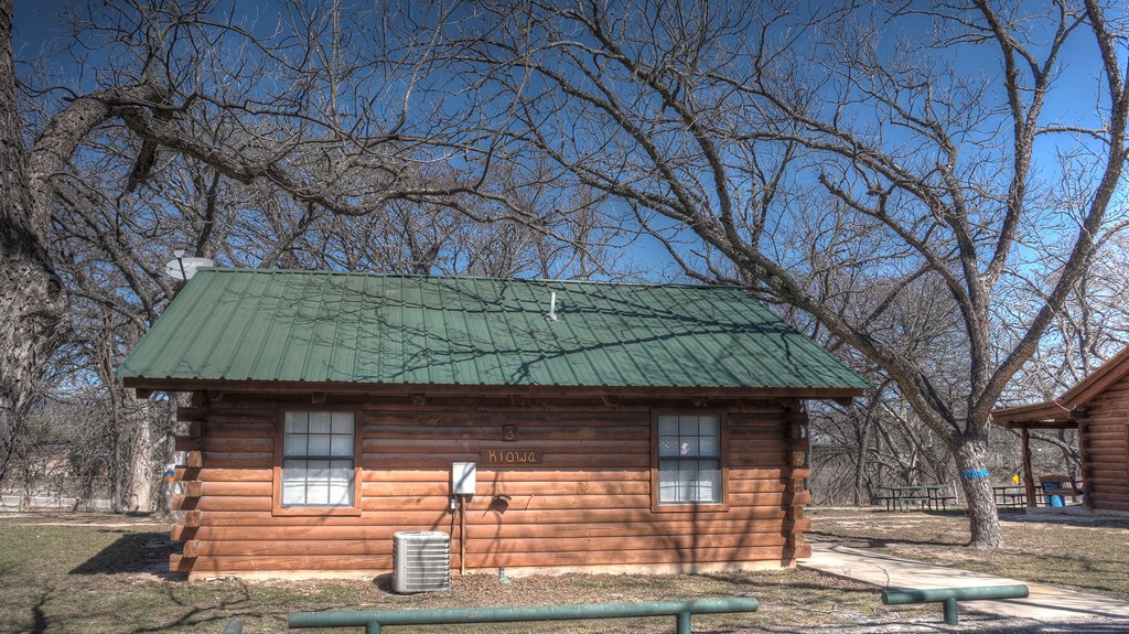98 Red Wright Road Rio Frio, TX 78879 - Photo 3 of 44 a front view of a house with garden