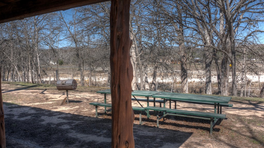 98 Red Wright Road Rio Frio, TX 78879 - Photo 5 of 44 a view of bench in the middle of a yard