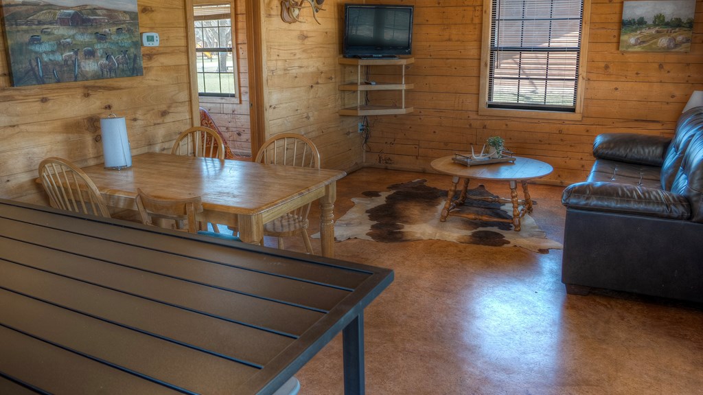 98 Red Wright Road Rio Frio, TX 78879 - Photo 8 of 44 a dining room with furniture and wooden floor