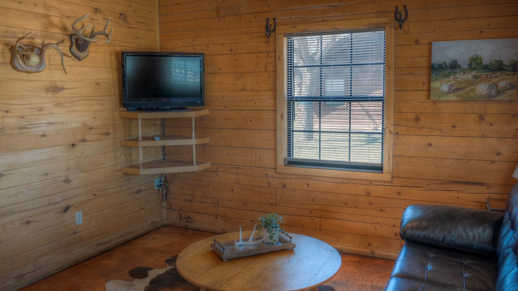 98 Red Wright Road Rio Frio, TX 78879 - Photo 9 of 44 a bathroom with a toilet and a sink