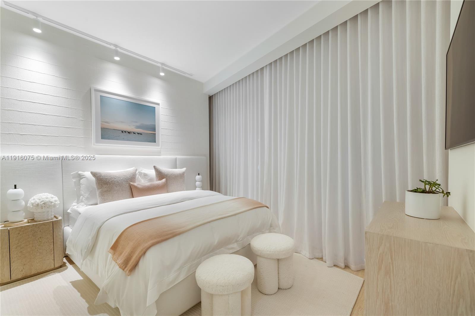 9001 Collins Avenue, Unit S207 Surfside, FL 33154 - Photo 13 of 14 a bathroom with a toilet sink and shower