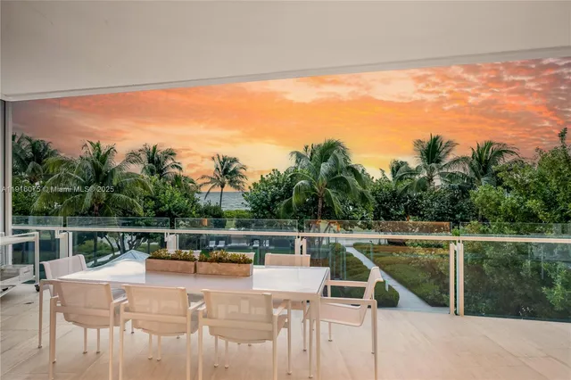 a view of a balcony with chairs