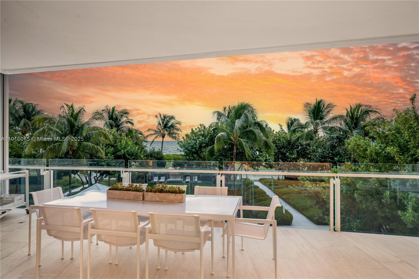9001 Collins Avenue, Unit S207 Surfside, FL 33154 - Photo 5 of 14 a view of a balcony with chairs