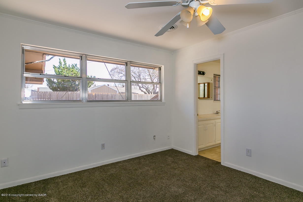 6107 Elmhurst Road Amarillo, TX 79106 - Photo 21 of 32 an empty room with a window