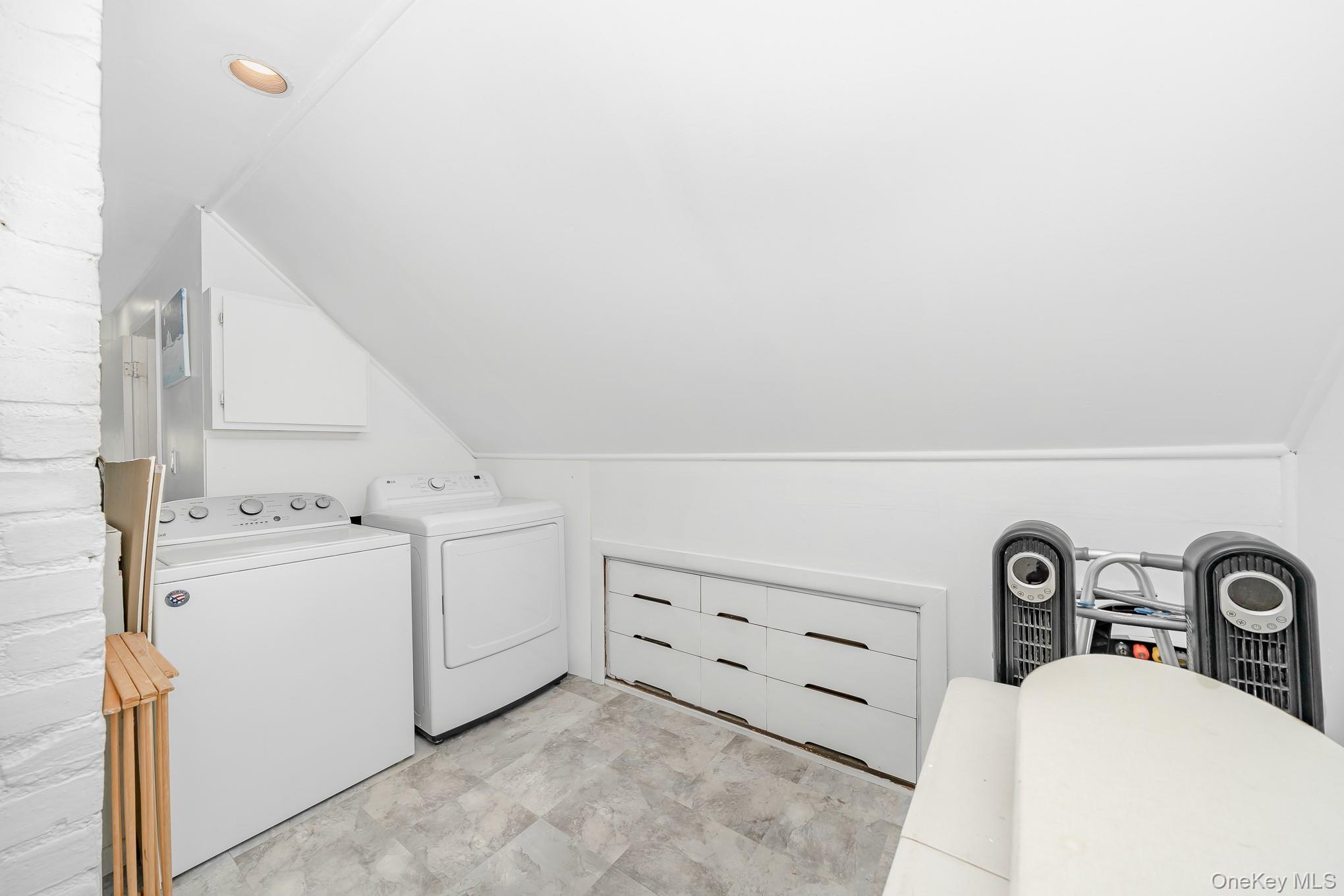 44 Disc Lane Wantagh, NY 11793 - Photo 15 of 26 a utility room with dryer and washer
