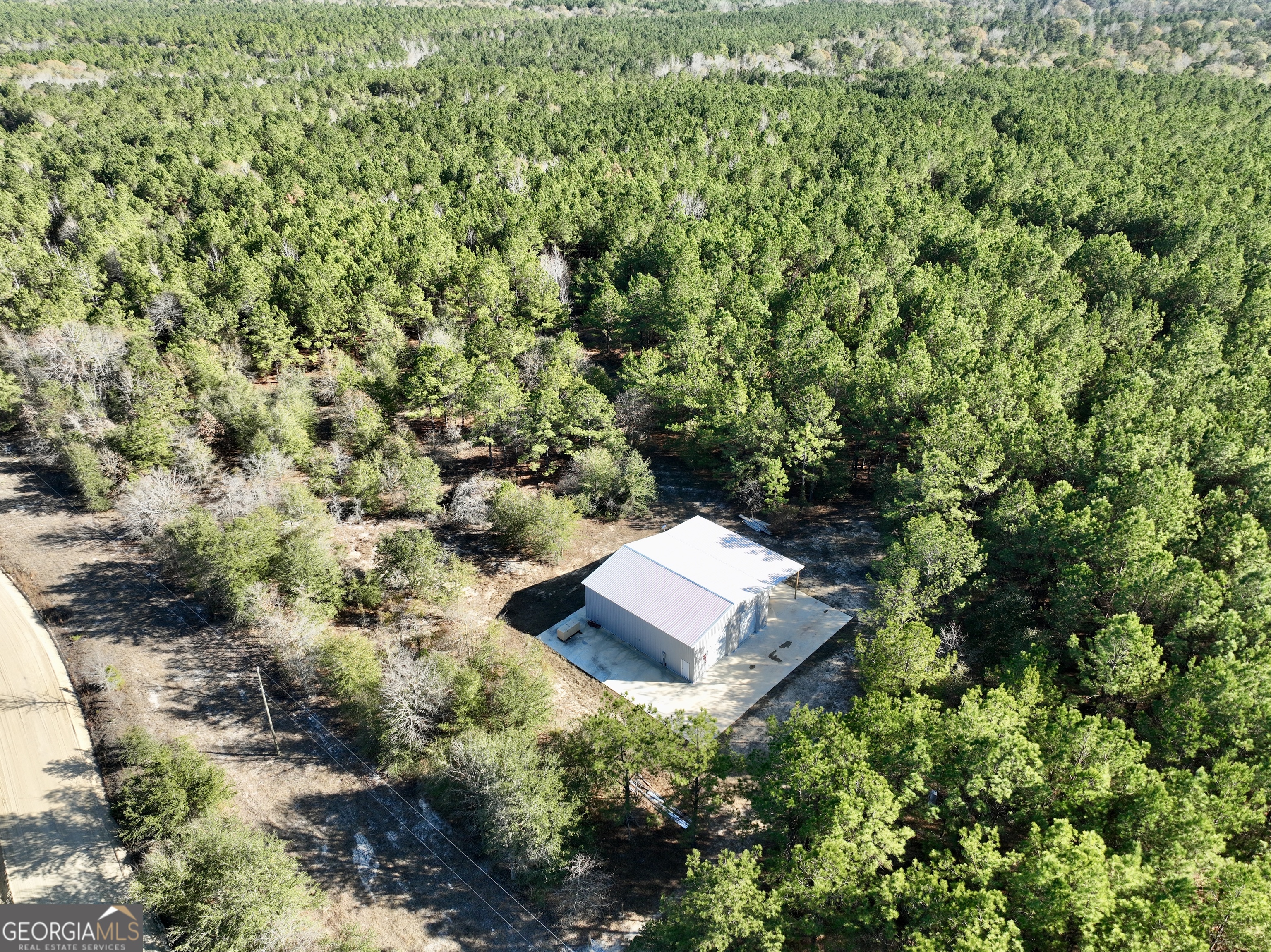 571 Sanders Cemetery Road Chauncey, GA 31011 - Photo 35 of 107 an aerial view of a house with a yard