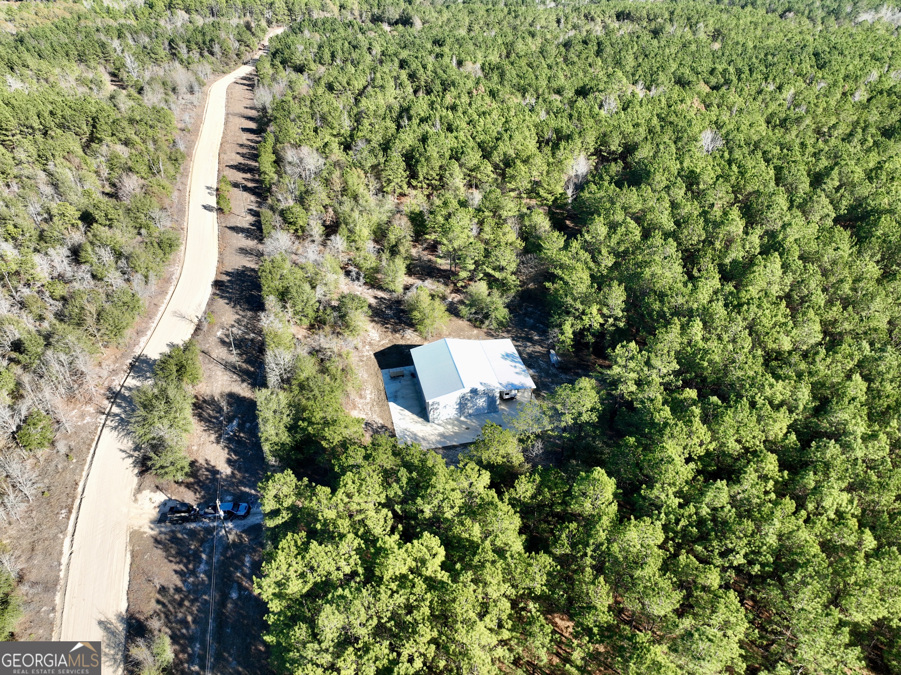 571 Sanders Cemetery Road Chauncey, GA 31011 - Photo 50 of 107 an aerial view of a house with a yard