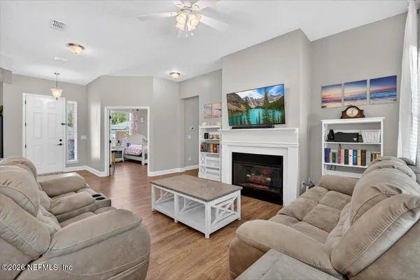 a large kitchen with kitchen island a sink counter space and stainless steel appliances