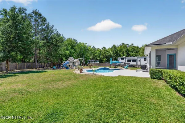 an aerial view of a house with a garden