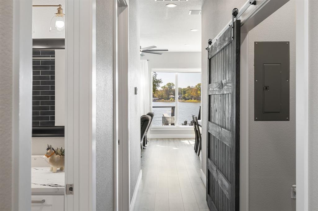 6811 Briar Road Azle, TX 76020 - Photo 11 of 34 a bathroom with a tub shower and sink