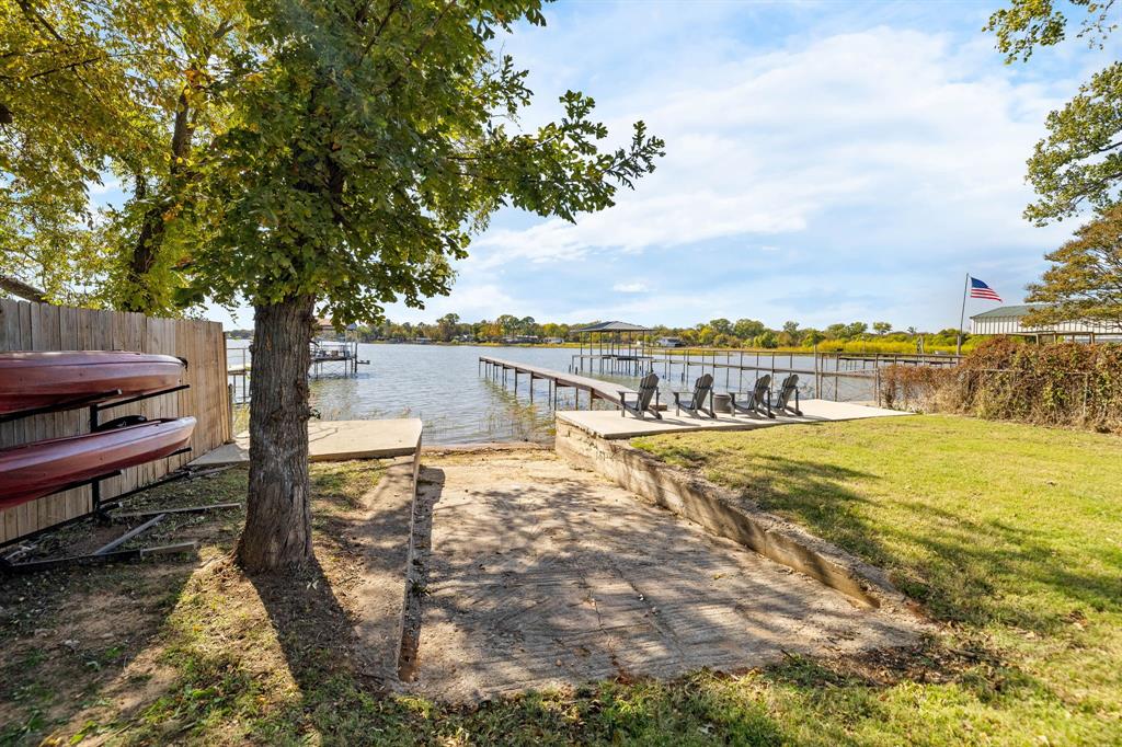 6811 Briar Road Azle, TX 76020 - Photo 30 of 34 a view of a swimming pool with an ocean view
