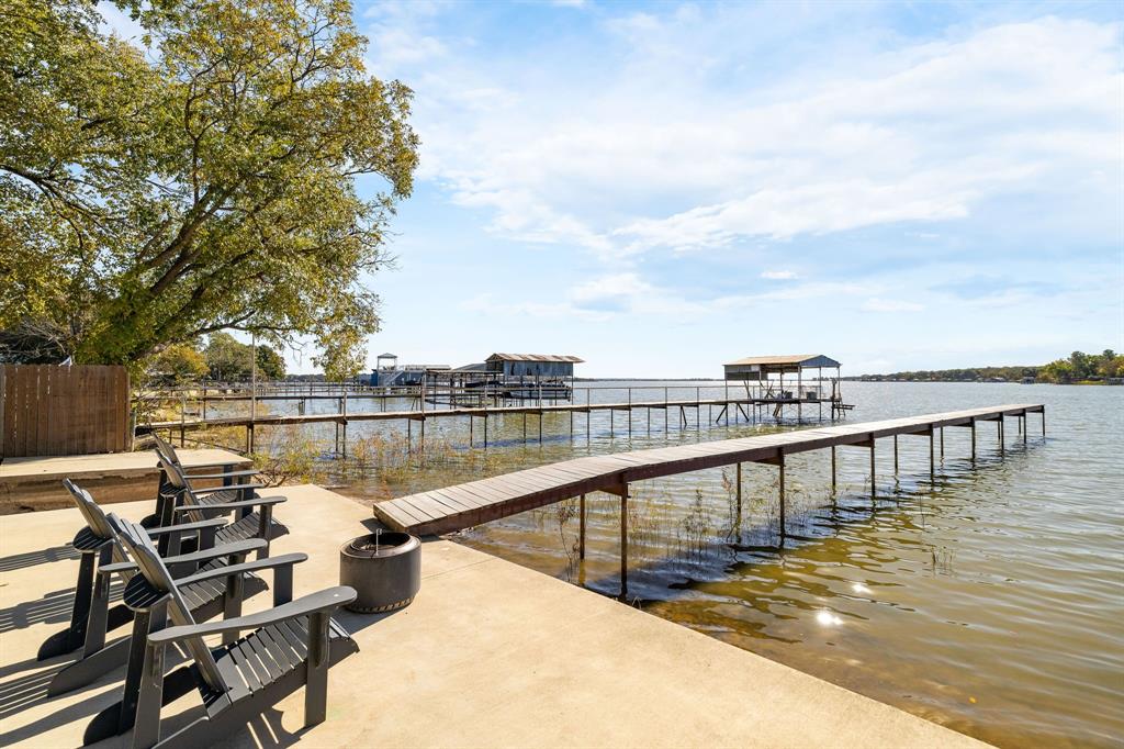 6811 Briar Road Azle, TX 76020 - Photo 31 of 34 a view of a balcony next to a lake