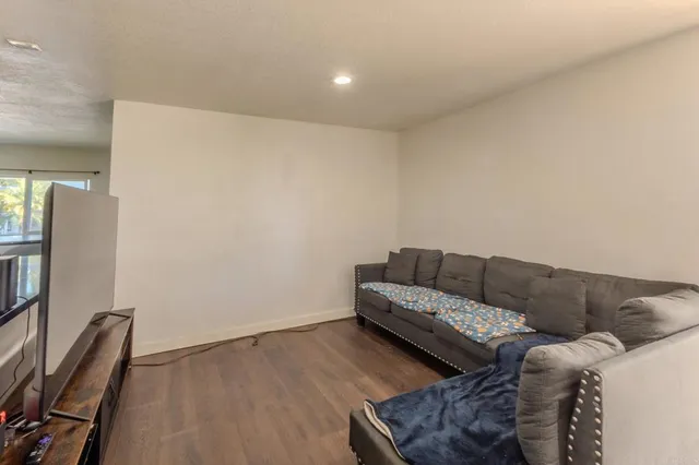 a living room with furniture and a couch