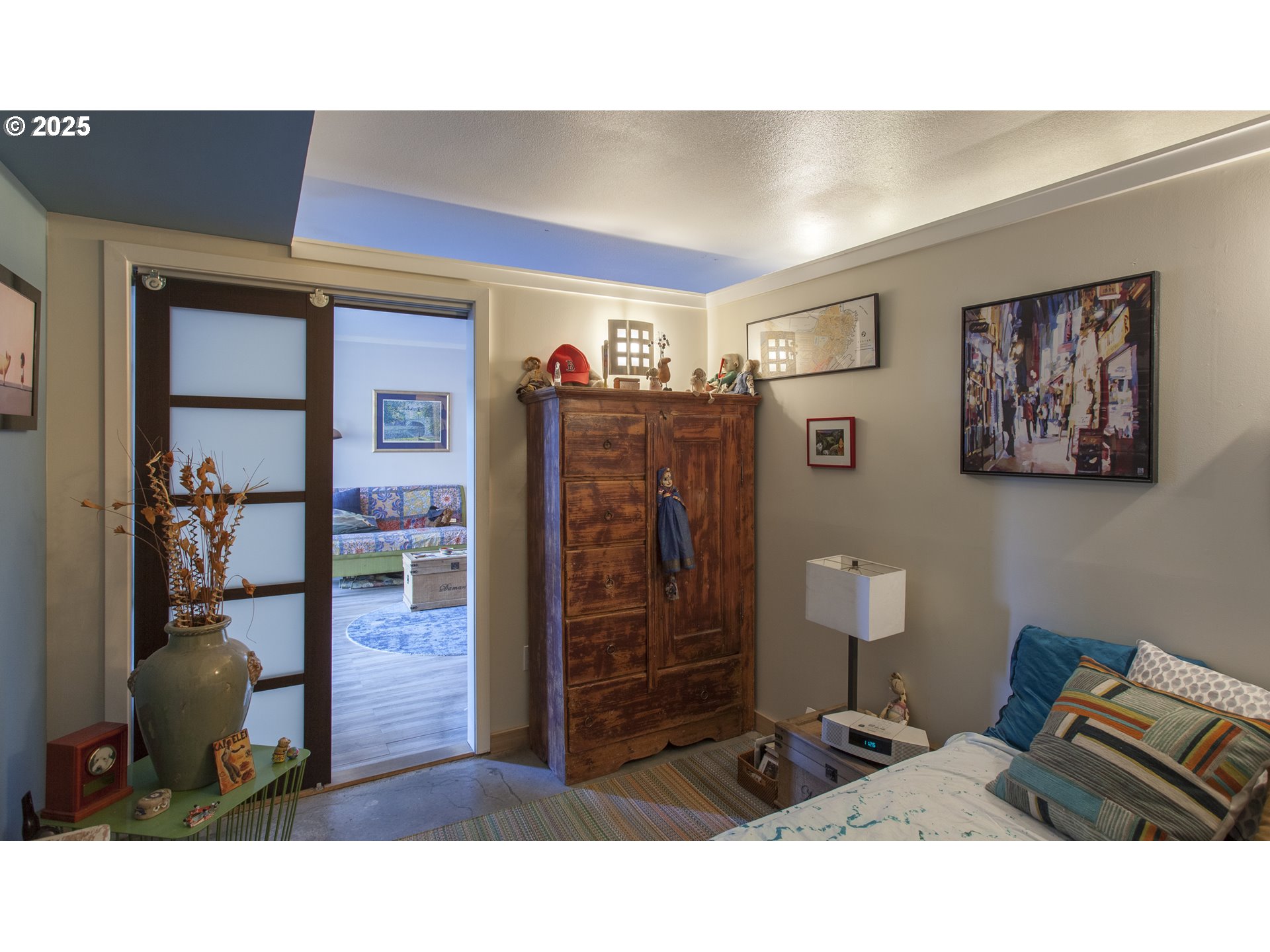 533 Northeast Holladay Street, Unit 308 Portland, OR 97232 - Photo 9 of 16 a living room with furniture and lamp