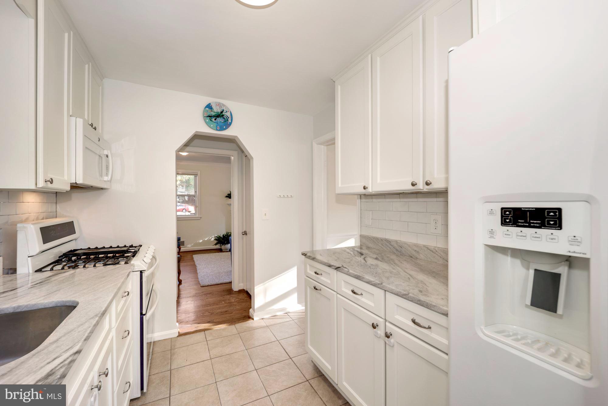 2315 Plyers Mill Road Silver Spring, MD 20902 - Photo 9 of 26 Kitchen with granite counters