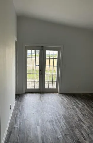 a view of room with hardwood floor