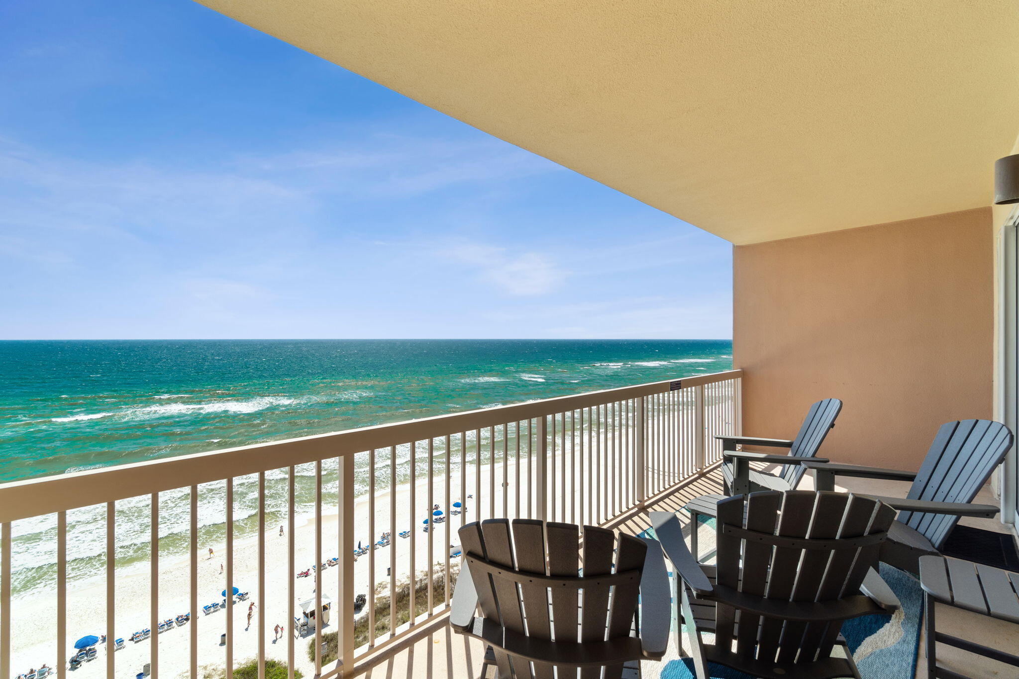 14825 Front Beach Road, Unit 1204 Panama City Beach, FL 32413 - Photo 13 of 13 a view of balcony with wooden floor and outdoor seating