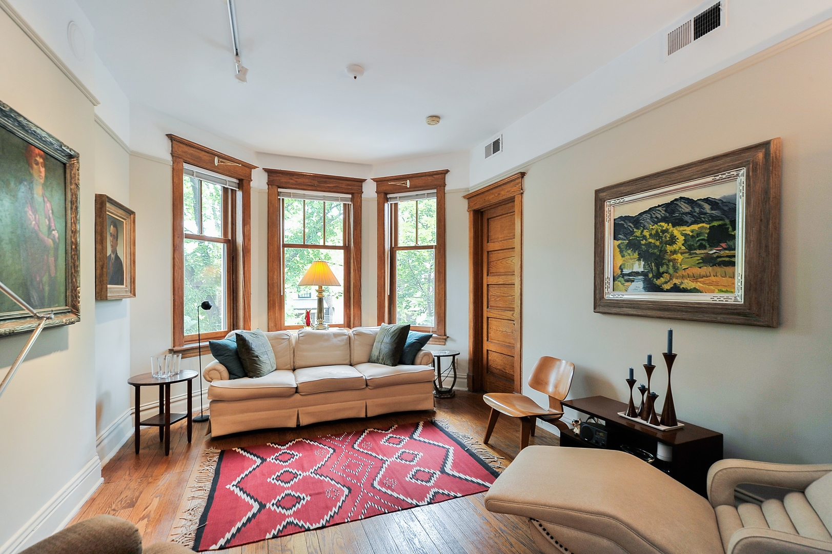 3729 North Wayne Avenue, Unit 2 Chicago, IL 60613 - Photo 3 of 12 a living room with furniture and a large window