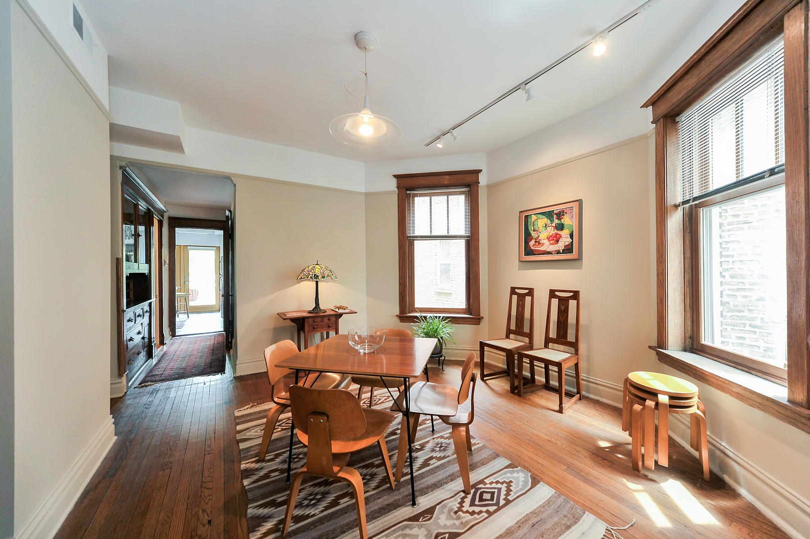 3729 North Wayne Avenue, Unit 2 Chicago, IL 60613 - Photo 7 of 12 a living room with furniture and a window