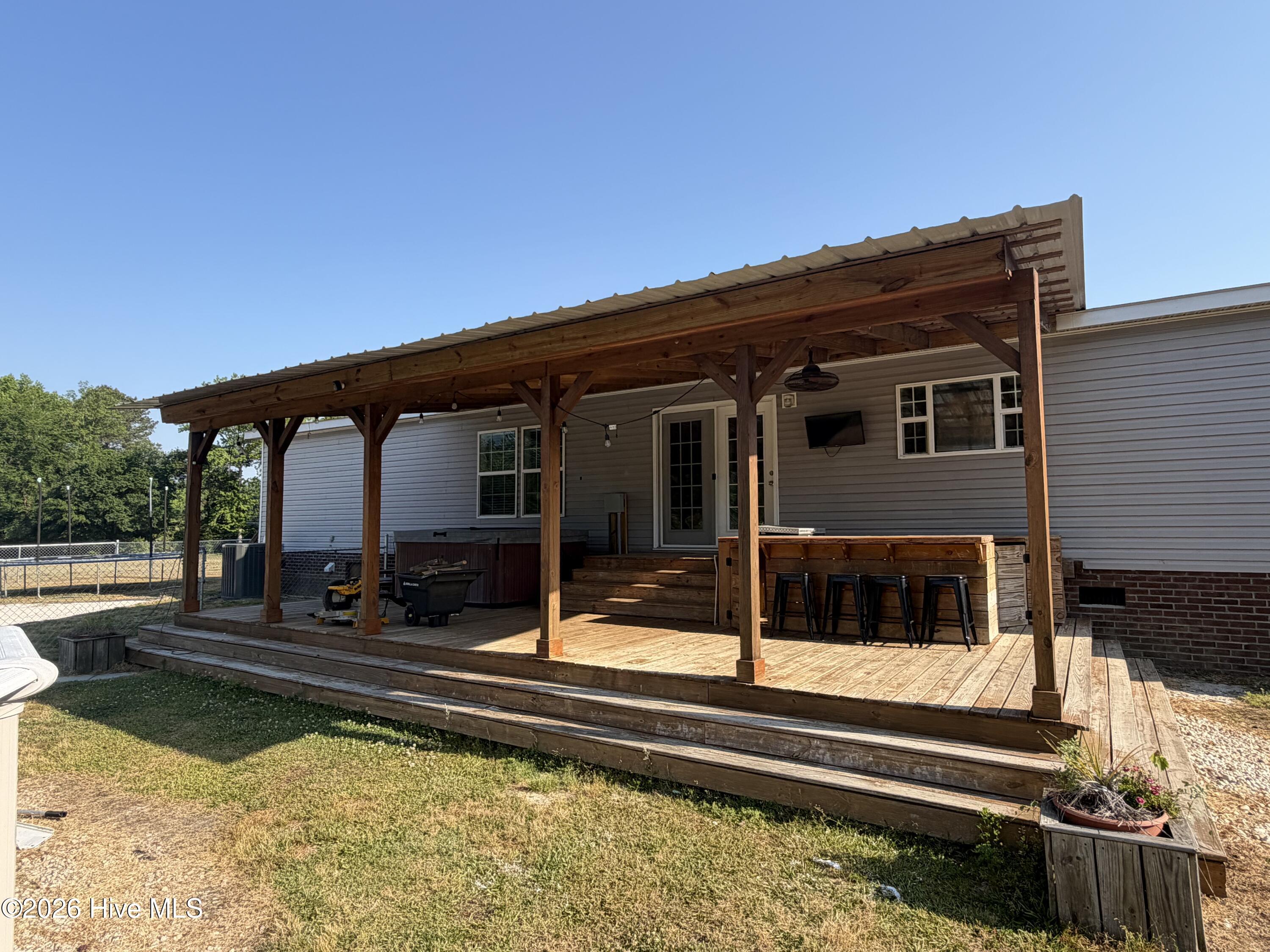 441 Mrs Tates Road Whiteville, NC 28472 - Photo 7 of 33 back deck
