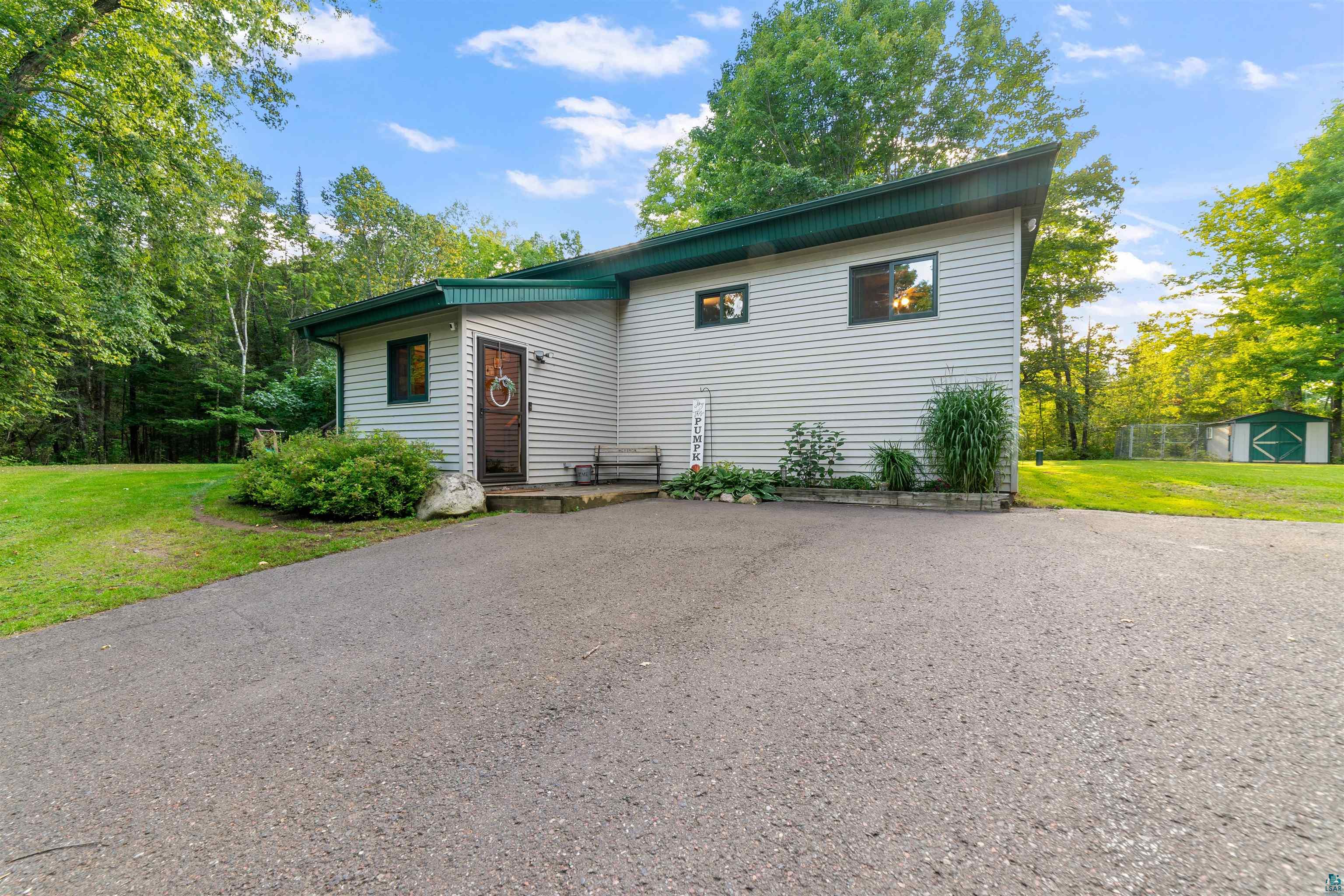 Front of house with deck.
