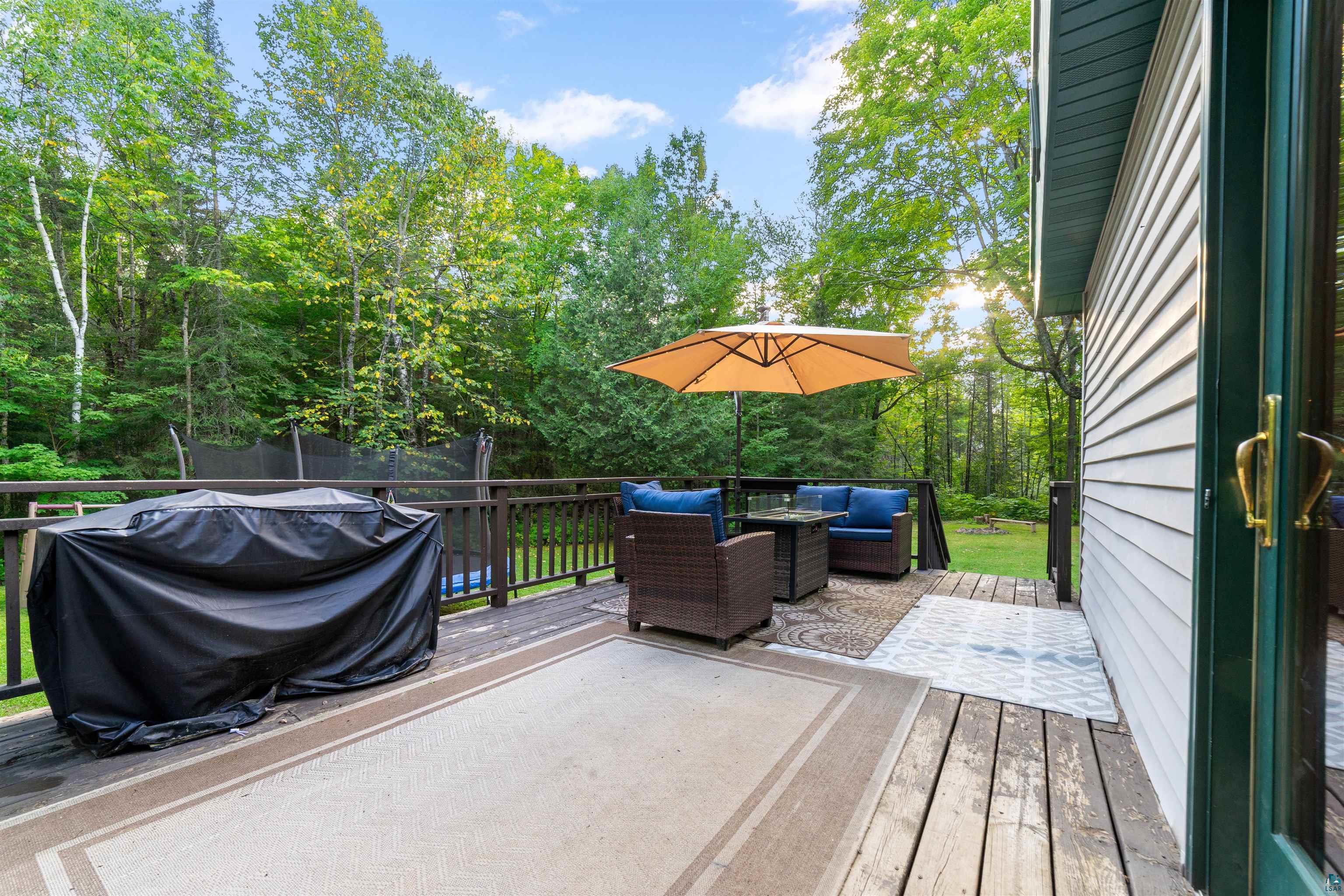 6451 Rice Lake Road Duluth, MN 55803 - Photo 22 of 31 Deck off of dinning room
