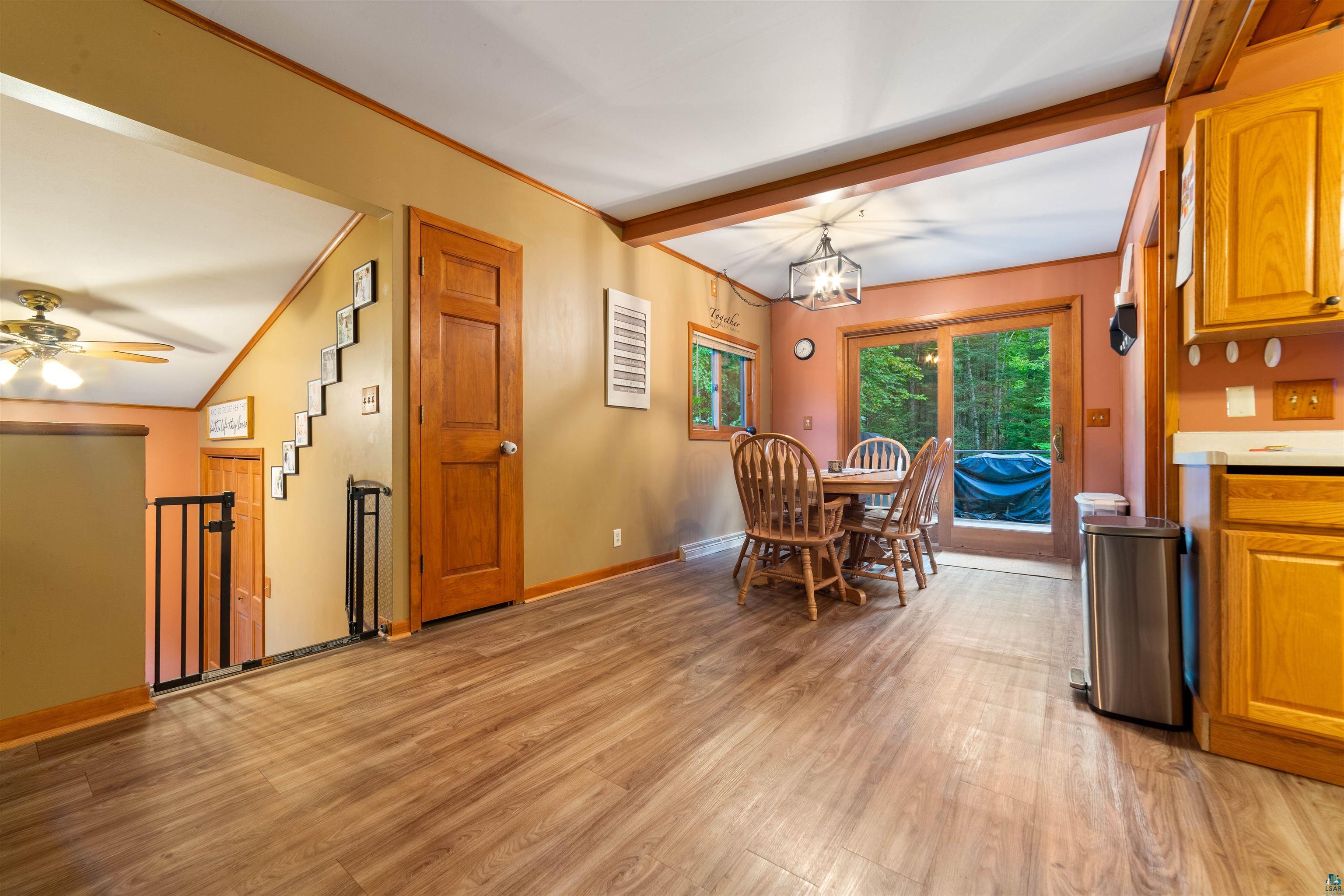 6451 Rice Lake Road Duluth, MN 55803 - Photo 6 of 31 Dinning room leading to deck